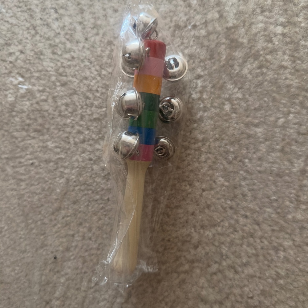NEW Stowy Rainbow Striped Wooden Bell Stick